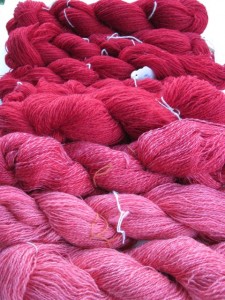 Shades of red in hand spun Romney wool