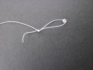 Tie a loop with a bead stopper