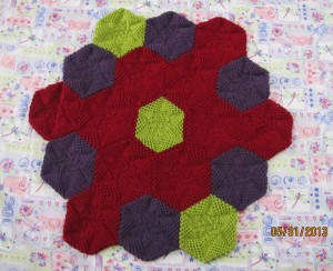 Pinwheels baby blanket knitted by Bridget