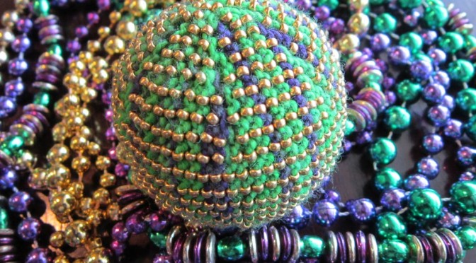 Mardi Gras Ball knitted by Joanne Conklin